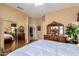 Serene main bedroom with mirrored closet doors, dresser, and natural light at 22026 N 44Th Pl, Phoenix, AZ 85050