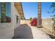 The backyard patio shows a mix of hardscape and natural elements at 2306 W Laurel Ln, Phoenix, AZ 85029