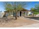 Charming single-story home featuring a quaint front yard and covered entry, perfect for a cozy suburban lifestyle at 2306 W Laurel Ln, Phoenix, AZ 85029