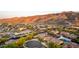 Serene aerial view of homes and lush desert landscape with rugged mountains in the background at 2335 E Allen St, Phoenix, AZ 85042