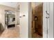 Bathroom boasts tiled shower, soaking tub and easy access to the main bedroom at 2335 E Allen St, Phoenix, AZ 85042