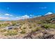 Elevated view of a community park with covered picnic area, parking, and desert scenery at 2335 E Allen St, Phoenix, AZ 85042