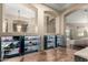 Custom foyer storage cabinets with designer tile floor and attractive archways at 2335 E Allen St, Phoenix, AZ 85042