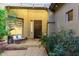 Inviting front porch with desert landscaping and a bench, perfect for relaxing at 2335 E Allen St, Phoenix, AZ 85042