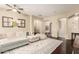 Cozy living room featuring hardwood floors, a large sectional sofa, and neutral decor at 2335 E Allen St, Phoenix, AZ 85042