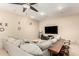 Entertainment room with comfortable seating, a large TV, and sporty décor for a relaxed vibe at 2335 E Allen St, Phoenix, AZ 85042