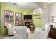 Cozy living room featuring a stone fireplace, comfortable seating, and natural light for a relaxing atmosphere at 2335 E Allen St, Phoenix, AZ 85042