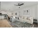 Bright living room flows into an open kitchen and dining area, perfect for entertaining at 2511 W Queen Creek Rd # 266, Chandler, AZ 85248