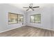 Bright bedroom showcasing light walls, flooring, and a large window for natural light at 2650 W Union Hills Dr # 131, Phoenix, AZ 85027