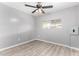 Neutral bedroom featuring a ceiling fan, linoleum floor, and window for natural light at 2650 W Union Hills Dr # 131, Phoenix, AZ 85027