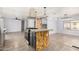 Modern kitchen showcasing a stylish island with a cooktop and room to eat at 2650 W Union Hills Dr # 131, Phoenix, AZ 85027