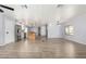 Spacious living room featuring modern floors and light gray walls in an open floor plan at 2650 W Union Hills Dr # 131, Phoenix, AZ 85027