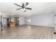 Spacious living room with wood floors and lots of space for entertaining guests at 2650 W Union Hills Dr # 131, Phoenix, AZ 85027