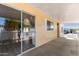 Inviting covered patio with sliding glass door access and neutral toned flooring at 2650 W Union Hills Dr # 131, Phoenix, AZ 85027