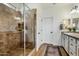 Tiled stand-up shower with a glass door, perfect for a modern bathroom at 27203 N 78Th Ln, Peoria, AZ 85383