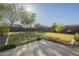 Large backyard with grass and trees at 27316 N Covered Wagon Rd, Phoenix, AZ 85085