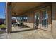 Inviting covered patio with tile flooring and outdoor seating area at 27316 N Covered Wagon Rd, Phoenix, AZ 85085