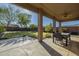 Covered patio with ceiling fan and a view of the spacious backyard at 27316 N Covered Wagon Rd, Phoenix, AZ 85085