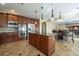 Gourmet kitchen featuring stainless steel appliances, a kitchen island and eat in nook at 27316 N Covered Wagon Rd, Phoenix, AZ 85085
