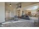 The open-concept layout showcases a seamless flow from the living room to the dining area at 27316 N Covered Wagon Rd, Phoenix, AZ 85085