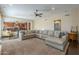Open floor plan showcasing a living area connected to the kitchen, with comfortable seating and modern decor at 27316 N Covered Wagon Rd, Phoenix, AZ 85085