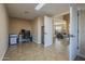 Office area showing modern decor, tile floors and a doorway to the living room at 27316 N Covered Wagon Rd, Phoenix, AZ 85085