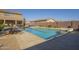 Relaxing pool area with a hammock and plenty of space for lounging at 27316 N Covered Wagon Rd, Phoenix, AZ 85085