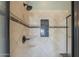 Shower with stone and tile surround, and a built-in niche at 27316 N Covered Wagon Rd, Phoenix, AZ 85085