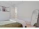 This bedroom features neutral walls and decor for a calming aesthetic at 3187 E Pineapple Rd, San Tan Valley, AZ 85143