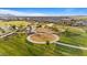 Lush community park with picnic areas, playgrounds, and walking paths, perfect for outdoor gatherings and recreation at 3187 E Pineapple Rd, San Tan Valley, AZ 85143