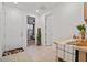 Bright entryway with tiled flooring, neutral paint, and tasteful decor create a warm welcome at 3187 E Pineapple Rd, San Tan Valley, AZ 85143