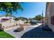 Backyard with patio, fire pit, and private pool with spa, perfect for outdoor relaxation and entertainment at 3206 W Knudsen Dr, Phoenix, AZ 85027