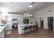 Well-equipped kitchen with a center island, seating, stainless steel appliances, and a pantry at 3206 W Knudsen Dr, Phoenix, AZ 85027
