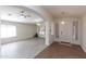 Open-concept living room featuring neutral paint, tile and laminate flooring and plenty of natural light at 3206 W Knudsen Dr, Phoenix, AZ 85027