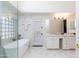 Bright, upgraded main bathroom with standalone soaking tub, glass shower, and double sink vanity at 3206 W Knudsen Dr, Phoenix, AZ 85027