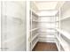 Walk-in pantry with extensive shelving, offering ample storage space for kitchen essentials at 3206 W Knudsen Dr, Phoenix, AZ 85027