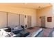 Outdoor patio with comfortable seating, privacy screens, and stone floors at 3206 W Knudsen Dr, Phoenix, AZ 85027