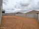 Spacious backyard enclosed by a block wall, offering privacy and potential at 3598 E Audrey Dr, San Tan Valley, AZ 85143