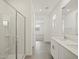 Bathroom showcasing a glass-enclosed shower, tile flooring, and bright vanity at 3598 E Audrey Dr, San Tan Valley, AZ 85143