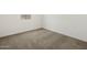 Cozy bedroom with soft carpeting, offering comfort and a serene atmosphere at 3598 E Audrey Dr, San Tan Valley, AZ 85143
