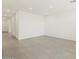 Spacious living room with recessed lighting and sleek tile flooring, perfect for gatherings at 3598 E Audrey Dr, San Tan Valley, AZ 85143