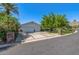 Long driveway leading to an attached two car garage at 4030 N 54Th Pl, Phoenix, AZ 85018