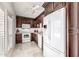 Traditional kitchen with granite countertops, white appliances and beautiful wood cabinets at 4030 N 54Th Pl, Phoenix, AZ 85018