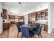 Beautiful kitchen with custom cabinets, stainless steel appliances, and a large center island with barstool seating at 4030 N 54Th Pl, Phoenix, AZ 85018