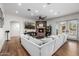 Cozy living room with a brick fireplace, comfortable seating, and plenty of natural light at 4030 N 54Th Pl, Phoenix, AZ 85018