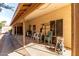 Spacious covered patio, perfect for outdoor seating and relaxation near the backyard at 4102 W Fallen Leaf Ln, Glendale, AZ 85310