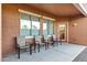 Outdoor patio with comfortable seating, providing a perfect space for relaxation at 42335 W Waterfall Way, Maricopa, AZ 85138
