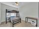 Bedroom with a bunk bed and an additional desk, great for or guests at 44314 W Mescal St, Maricopa, AZ 85138