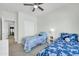 Shared bedroom featuring two twin beds and closet at 44314 W Mescal St, Maricopa, AZ 85138