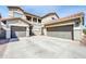Attractive home featuring a three-car garage and well-maintained concrete driveway at 44314 W Mescal St, Maricopa, AZ 85138